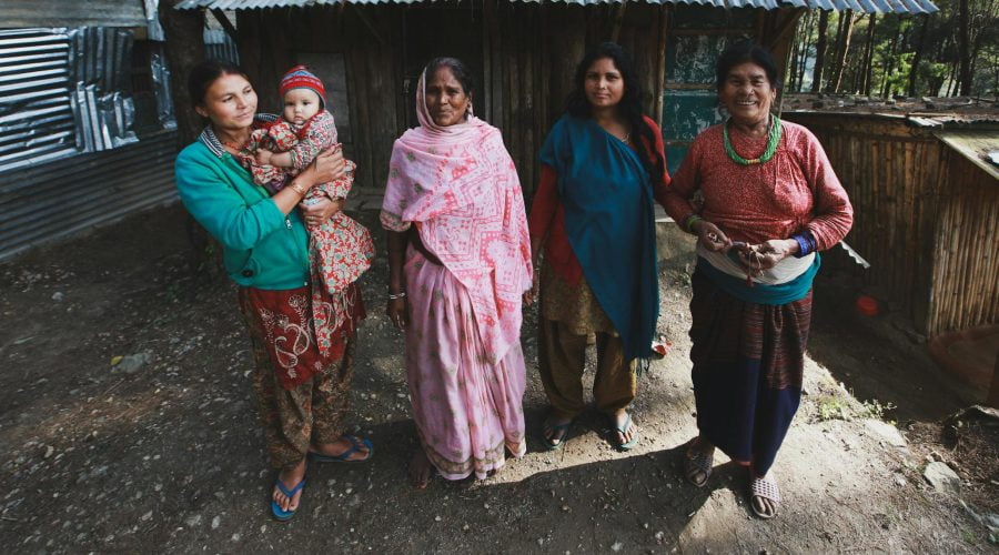 Women in Traditional Clothes in Tribal Village