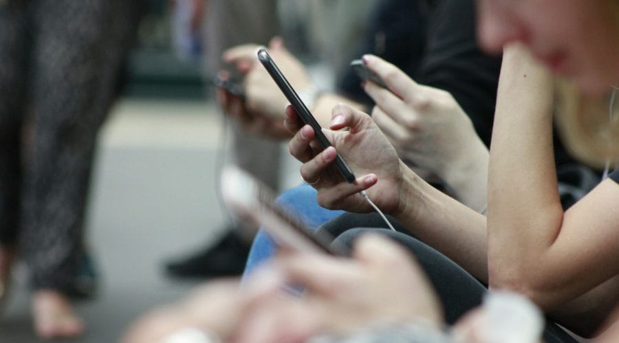person holding black phone