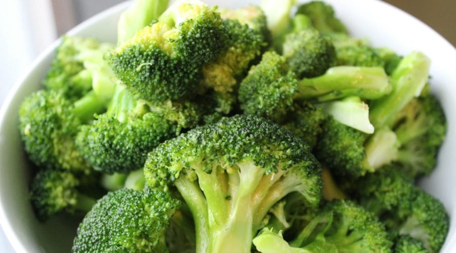 green broccoli on white ceramic plate