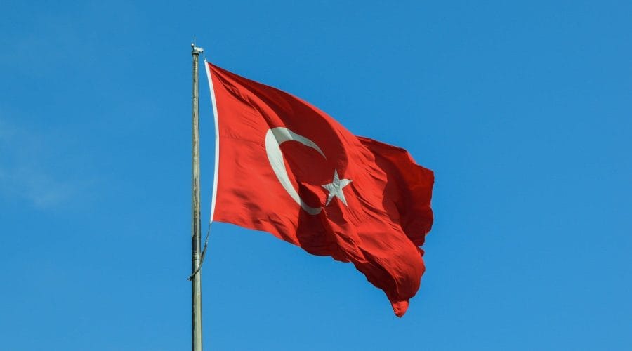red and white national waving flag
